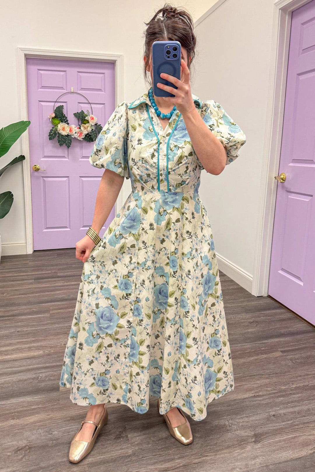 blue and cream floral print puff sleeve v neck flowy midi dress