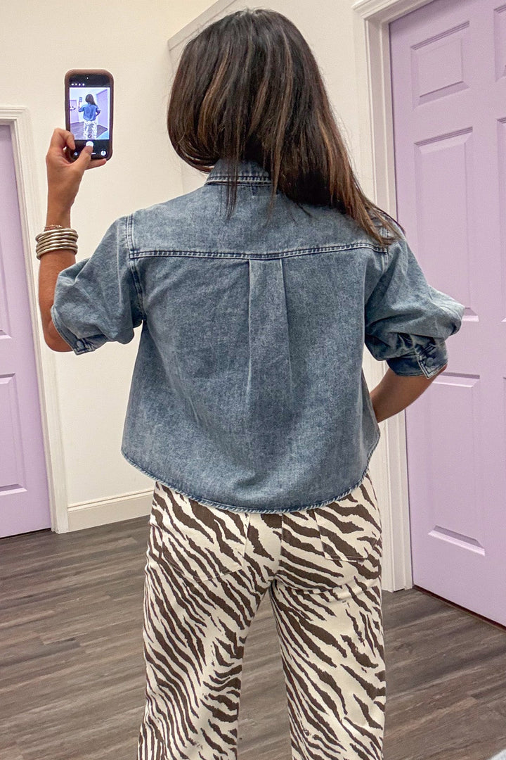 blue denim collared button front short puff sleeve semi-cropped top with rounded bottom hem