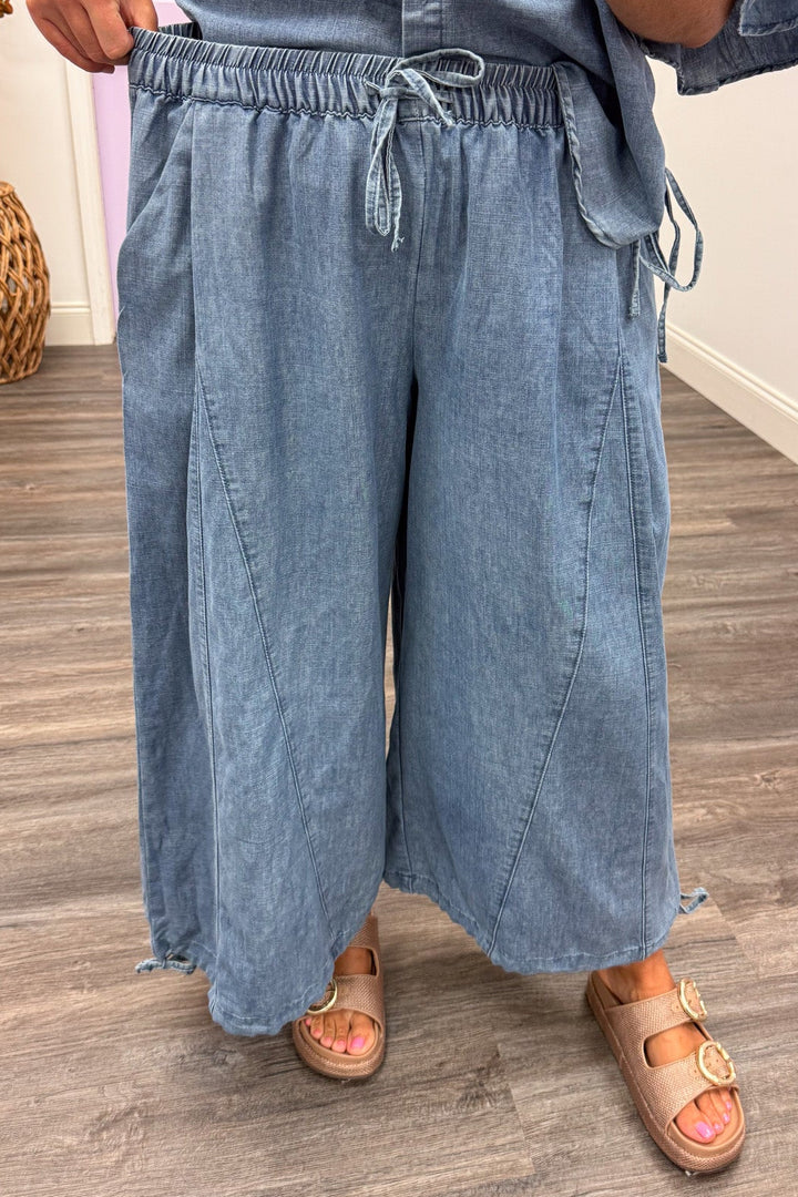washed blue denim elastic waist wide leg drawstring ankle jogger pants