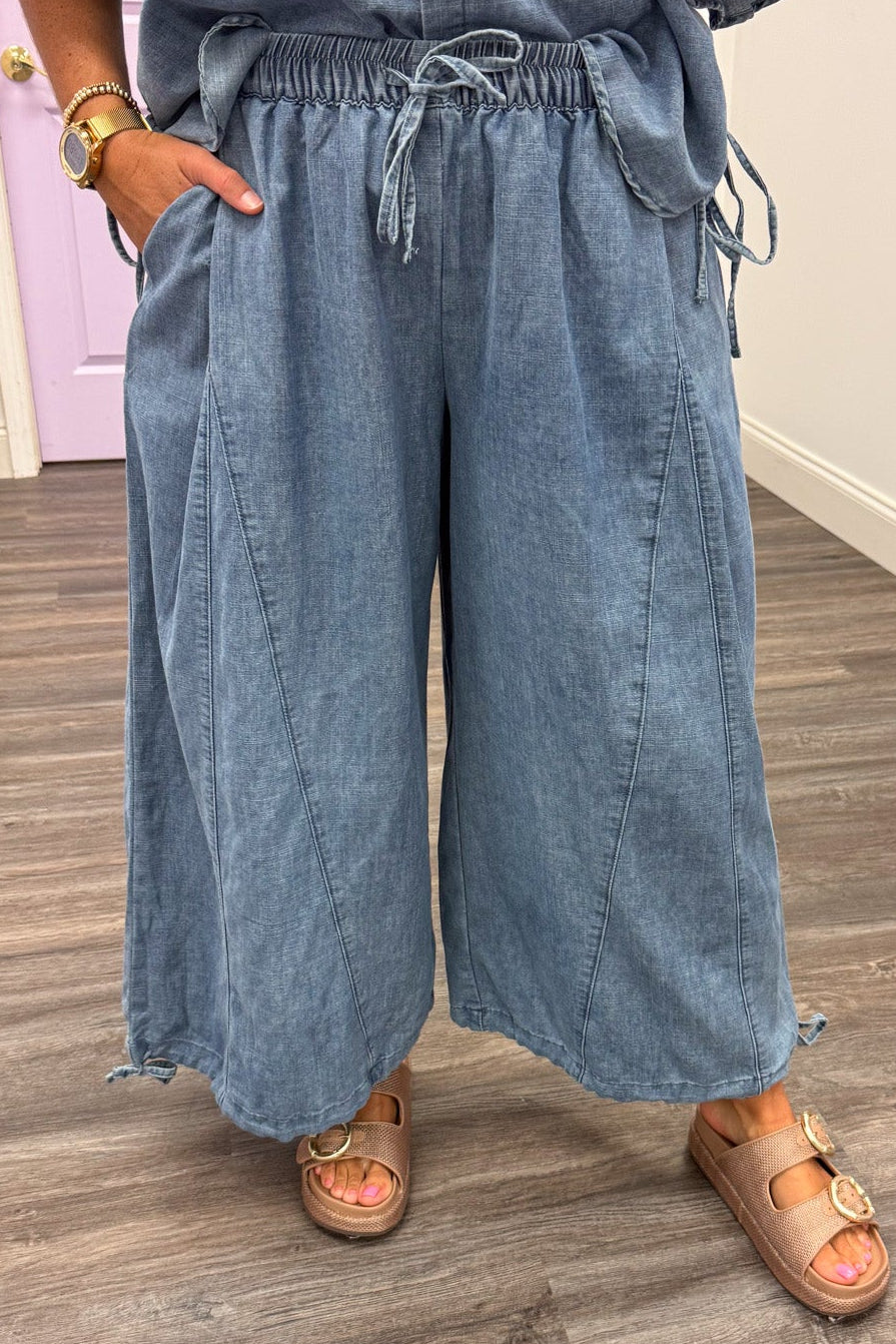 washed blue denim drawstring waist wide leg drawstring ankle jogger pants