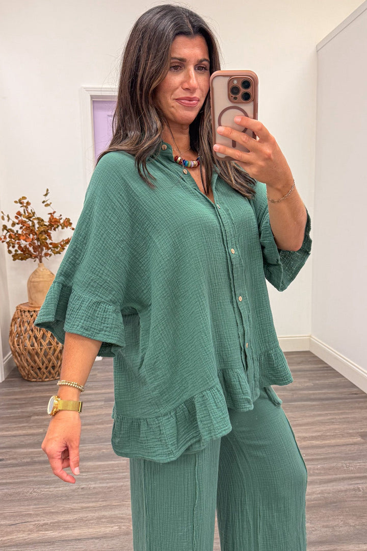 solid bluish green ruffle trim collared neckline button down short sleeve cotton gauze top