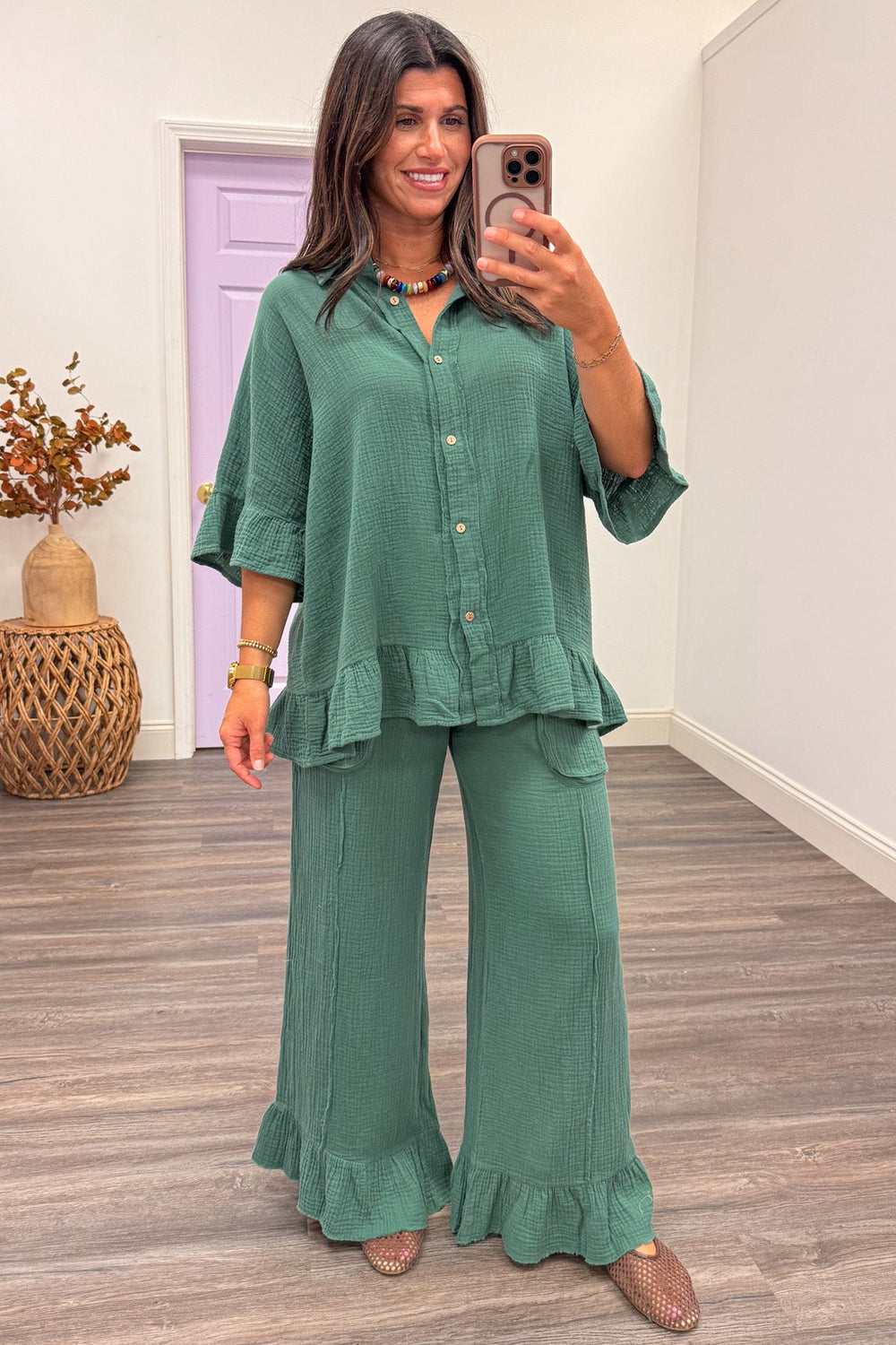 solid bluish green ruffle trim button down short sleeve cotton gauze top with reverse seam details