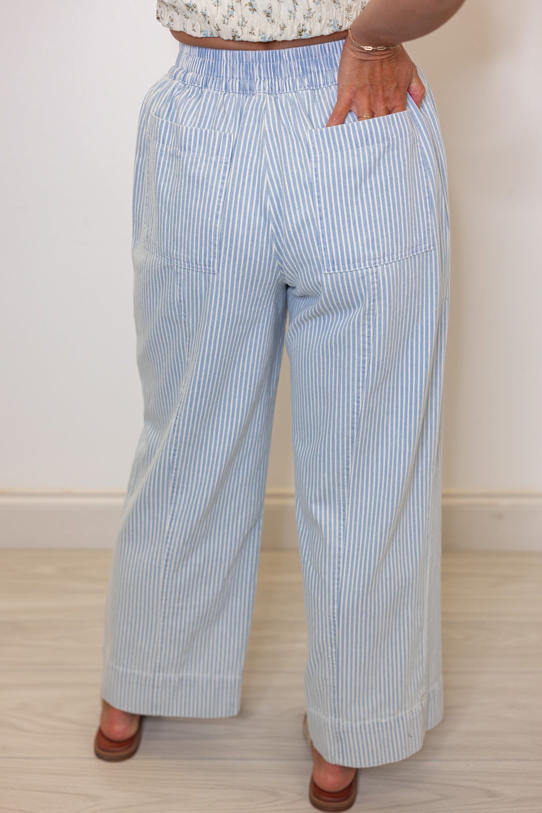 Women's light blue and cream striped wide leg cropped pants by &merci showing back view