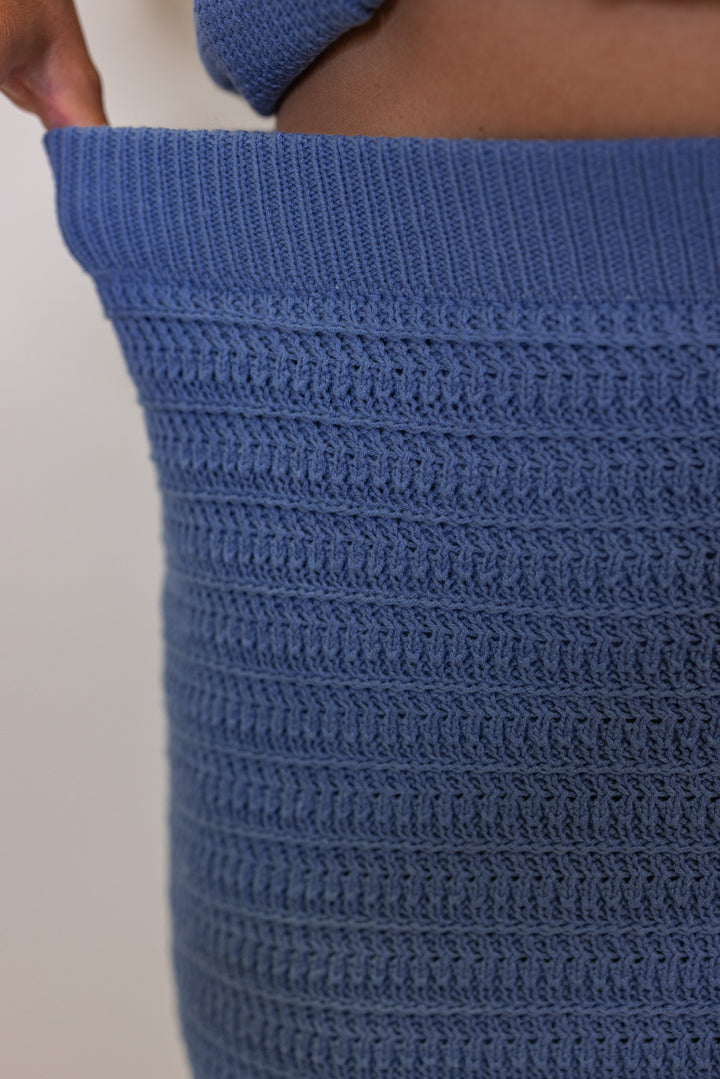 Women's blue sweater knit maxi skirt with matching sleeveless contrasting knit top by Wishlist showing skirts elastic waistband