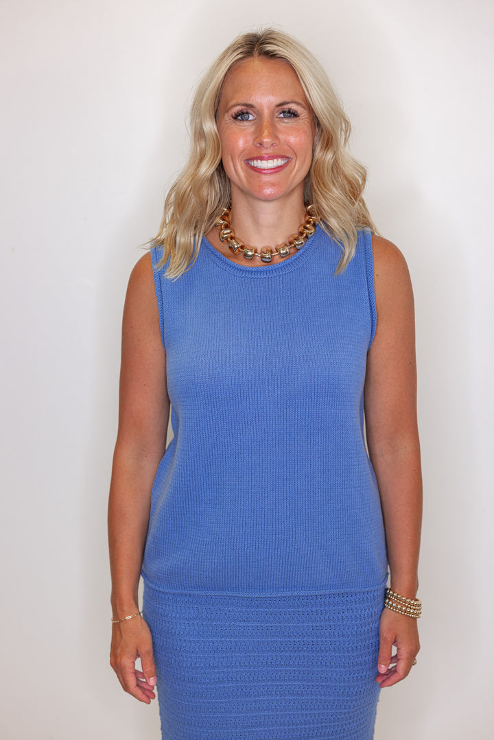 Women's blue sweater knit maxi skirt with matching sleeveless contrasting knit top by Wishlist showing up close view of top