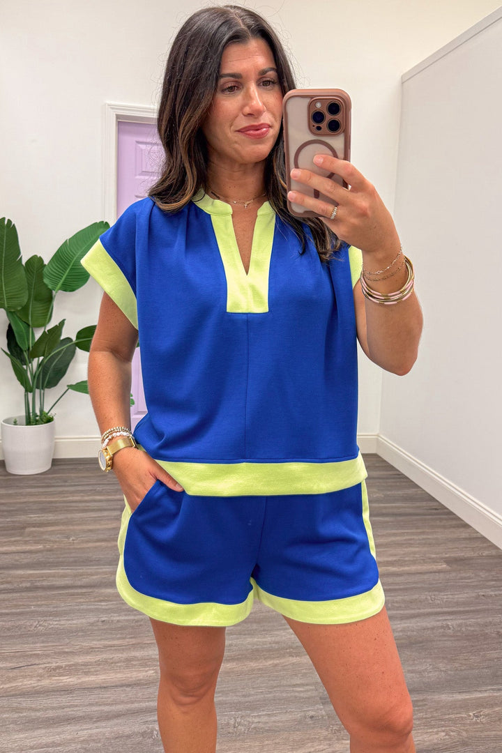 royal blue with lime colorblock trim capped sleeve v neckline knit top