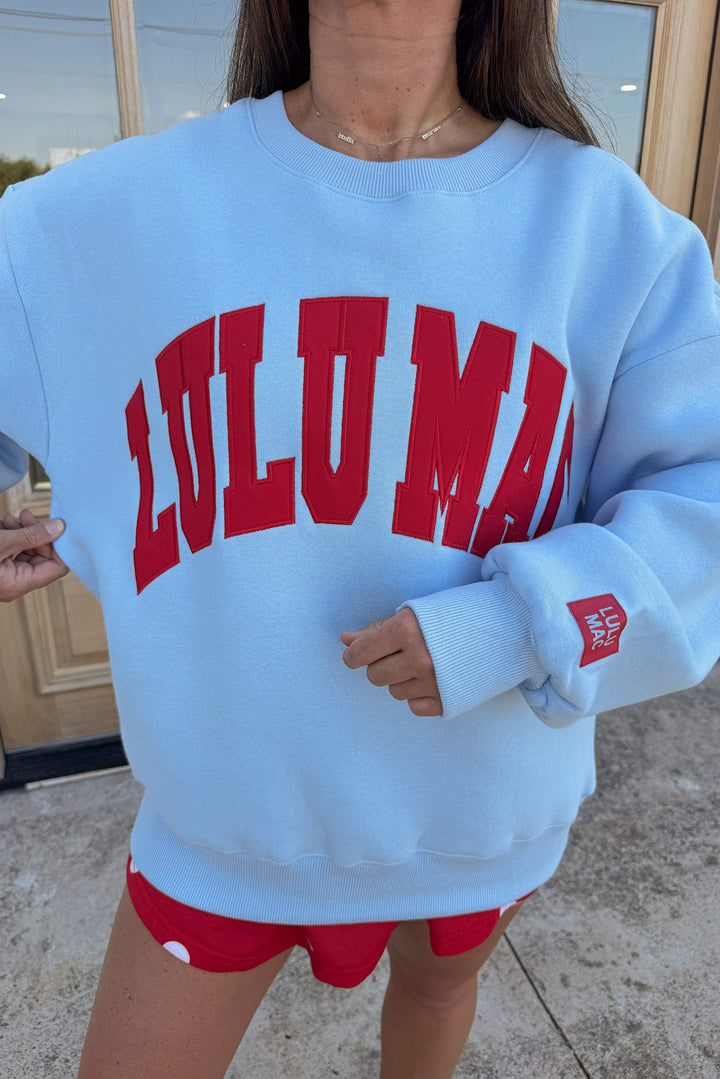 light blue with bright red embroidered lulu mac cuffed long sleeve sweatshirt