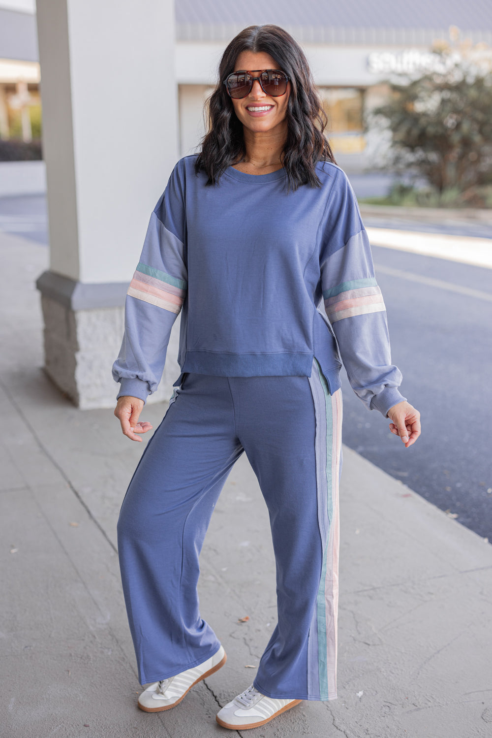 Women's knit top and matching pants set in blue denim shade with stripe trim details by Very J showing full front view