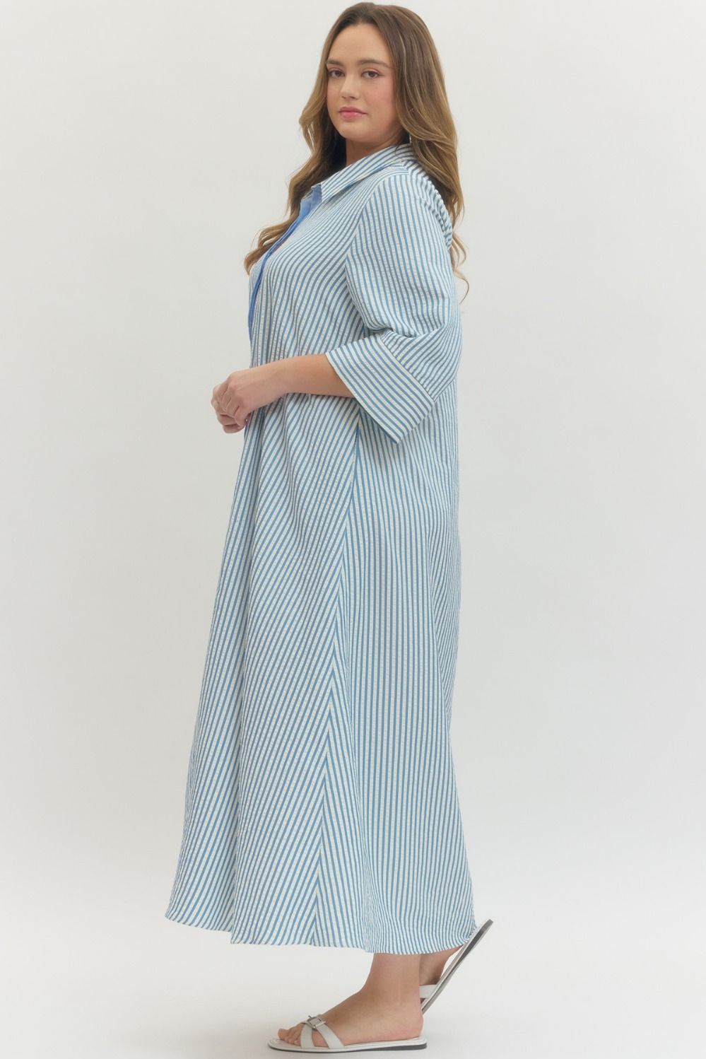 Women's plus size striped blue maxi dress by Entro showing full side view