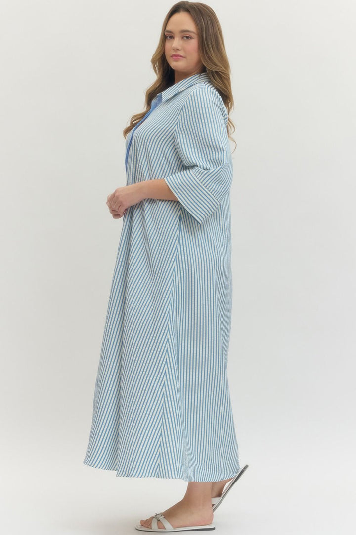 Women's plus size striped blue maxi dress by Entro showing full side view