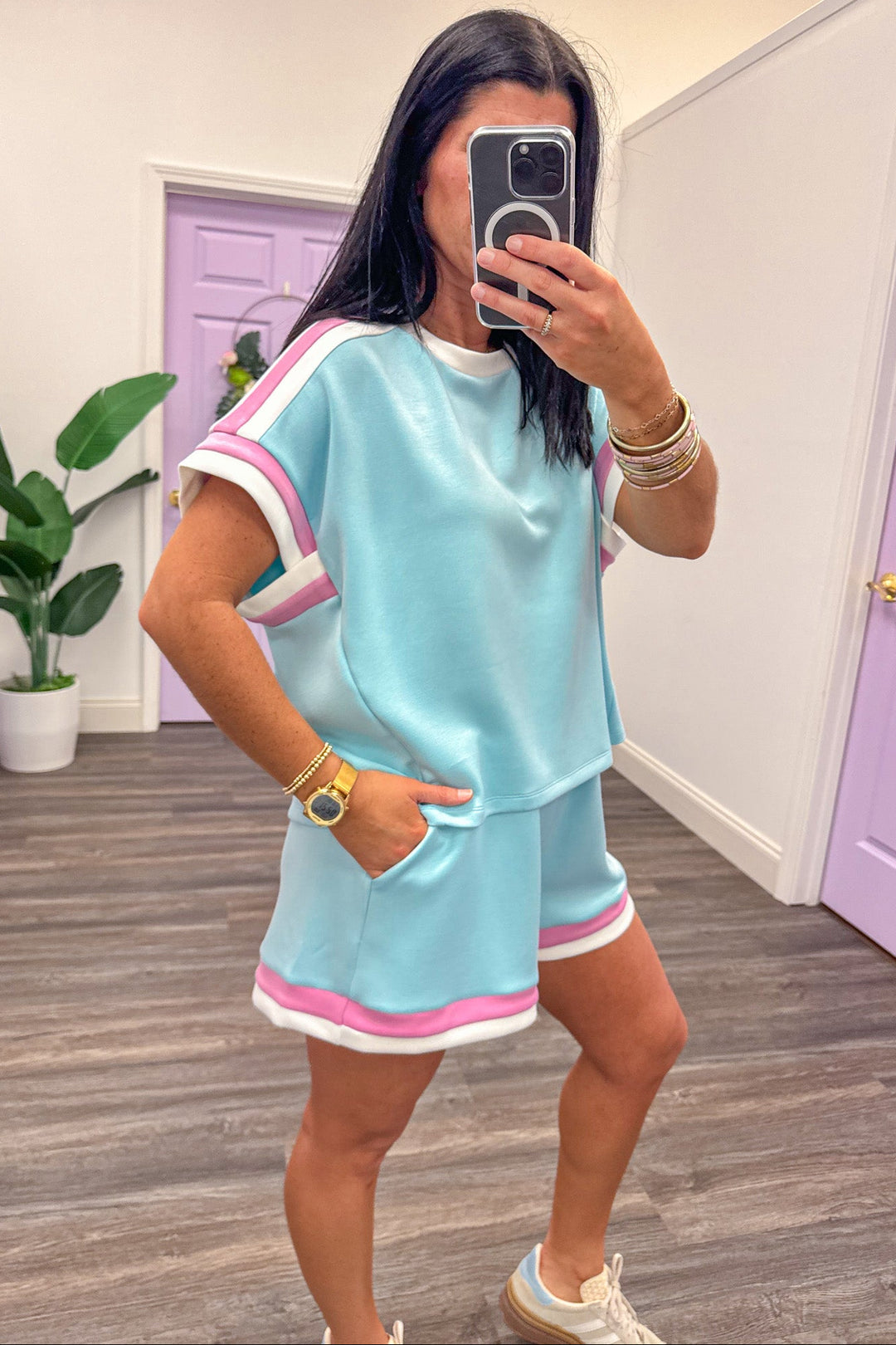 pink and white trimmed hi-low hem scuba knit blue top
