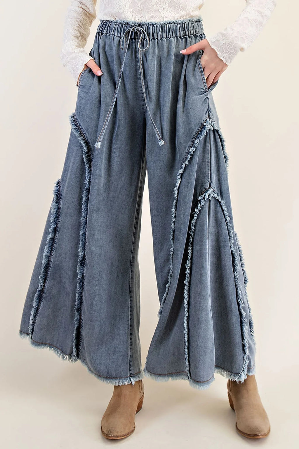 Easel Palazzo style wide leg washed blue denim pants with frayed fringe details