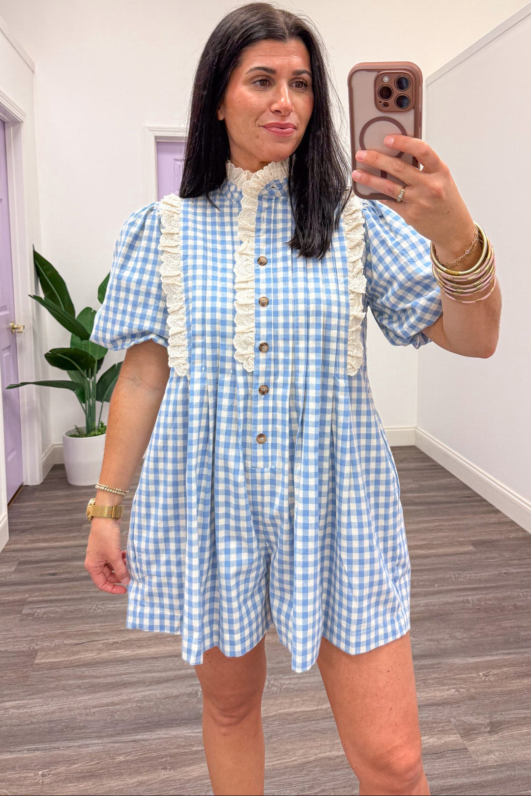 light blue and cream gingham print button front elastic puff sleeve romper
