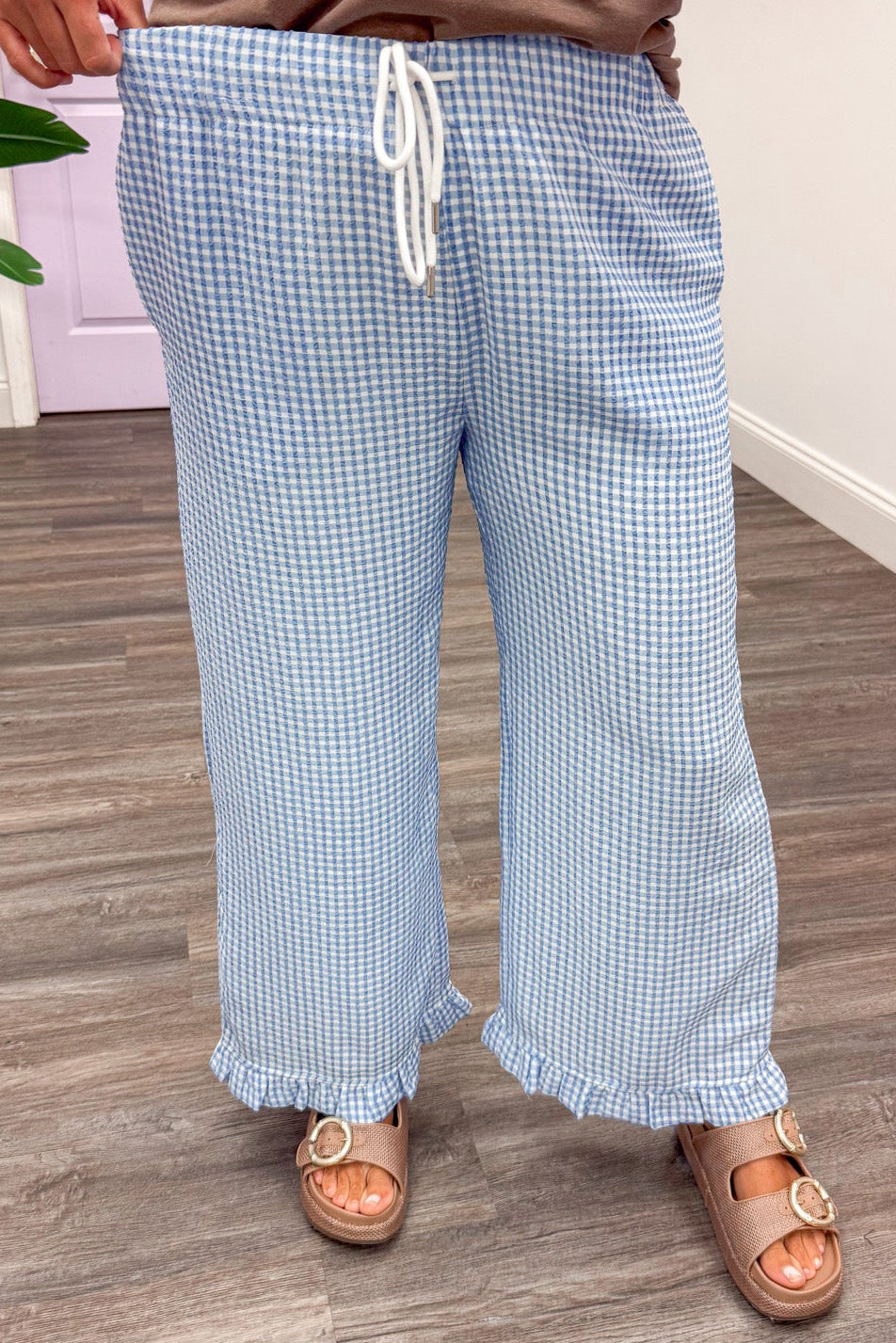 light blue and white gingham checkered print elastic waist ruffle hem wide leg pants