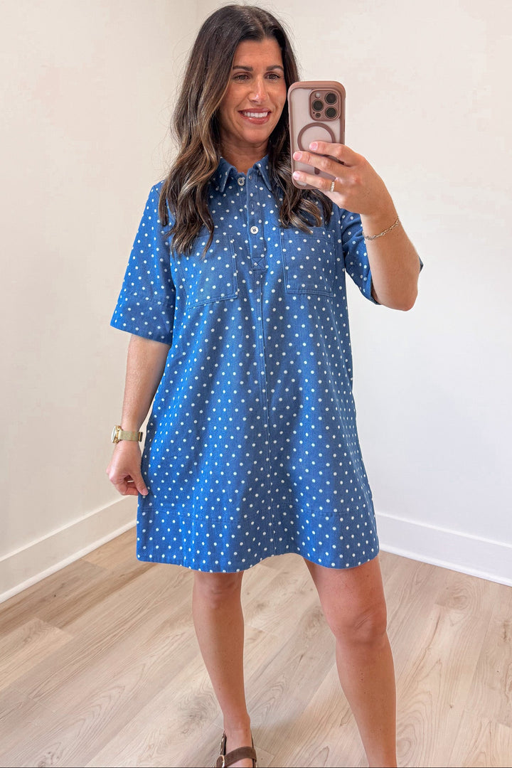 blue denim with white polka dot print short sleeve button bodice mini dress with front chest pockets