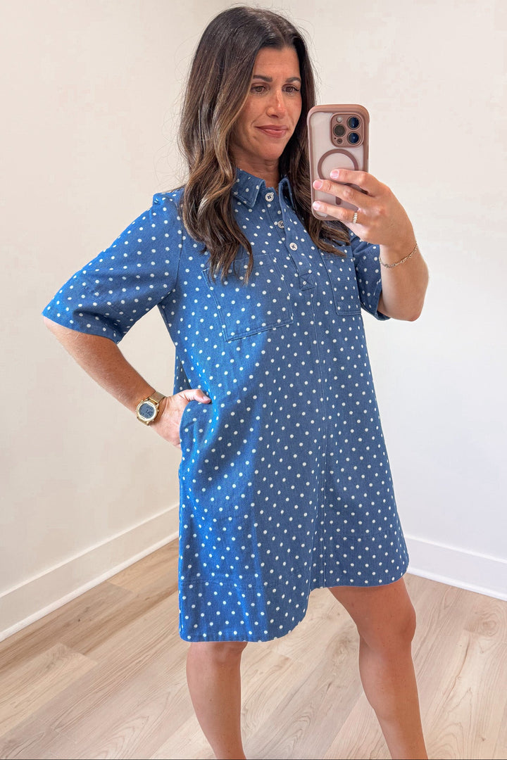 blue denim with white polka dot print short sleeve button front bodice mini dress with side pockets