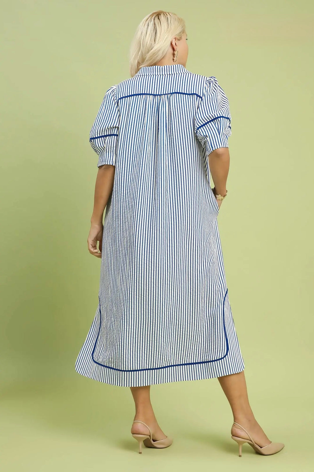Women's Umgee textured blue and white striped midi dress with navy trim in plus size showing full back view