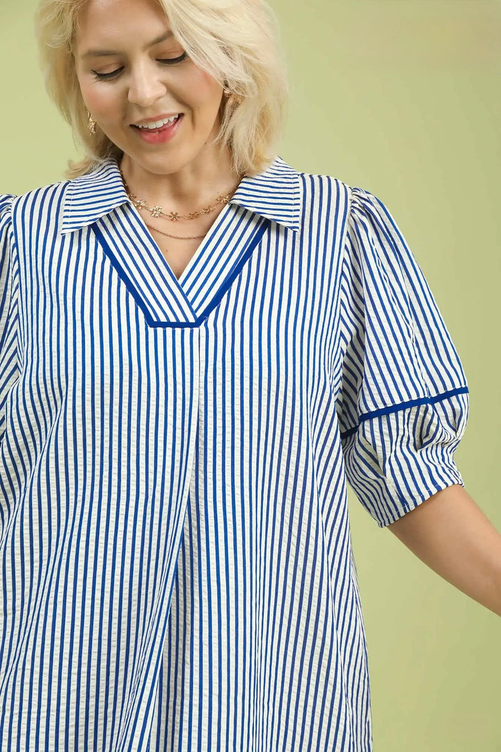 Women's Umgee blue and white striped long dress with navy trim in plus size showing textured fabric