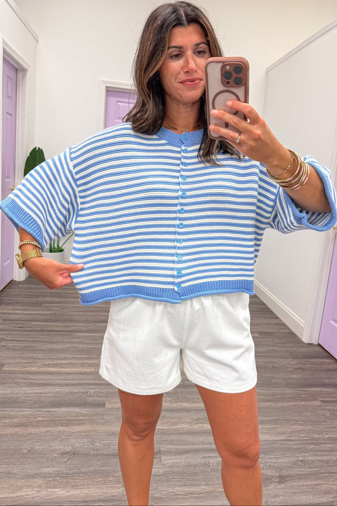 blue and off white striped button front semi-cropped relaxed silhouette textured knit cardigan top