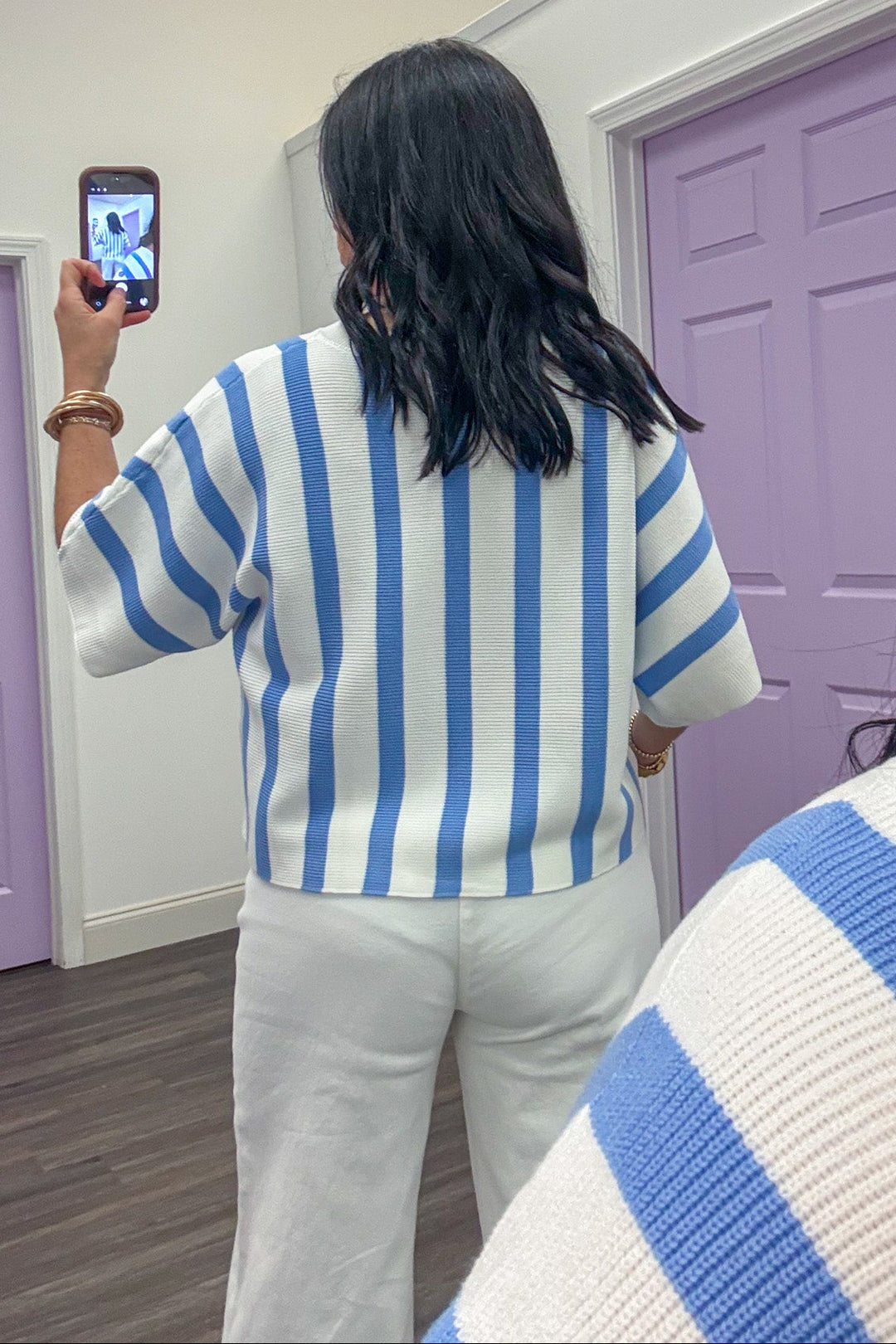 blue and off white vertical striped dolman sleeve knit top back view