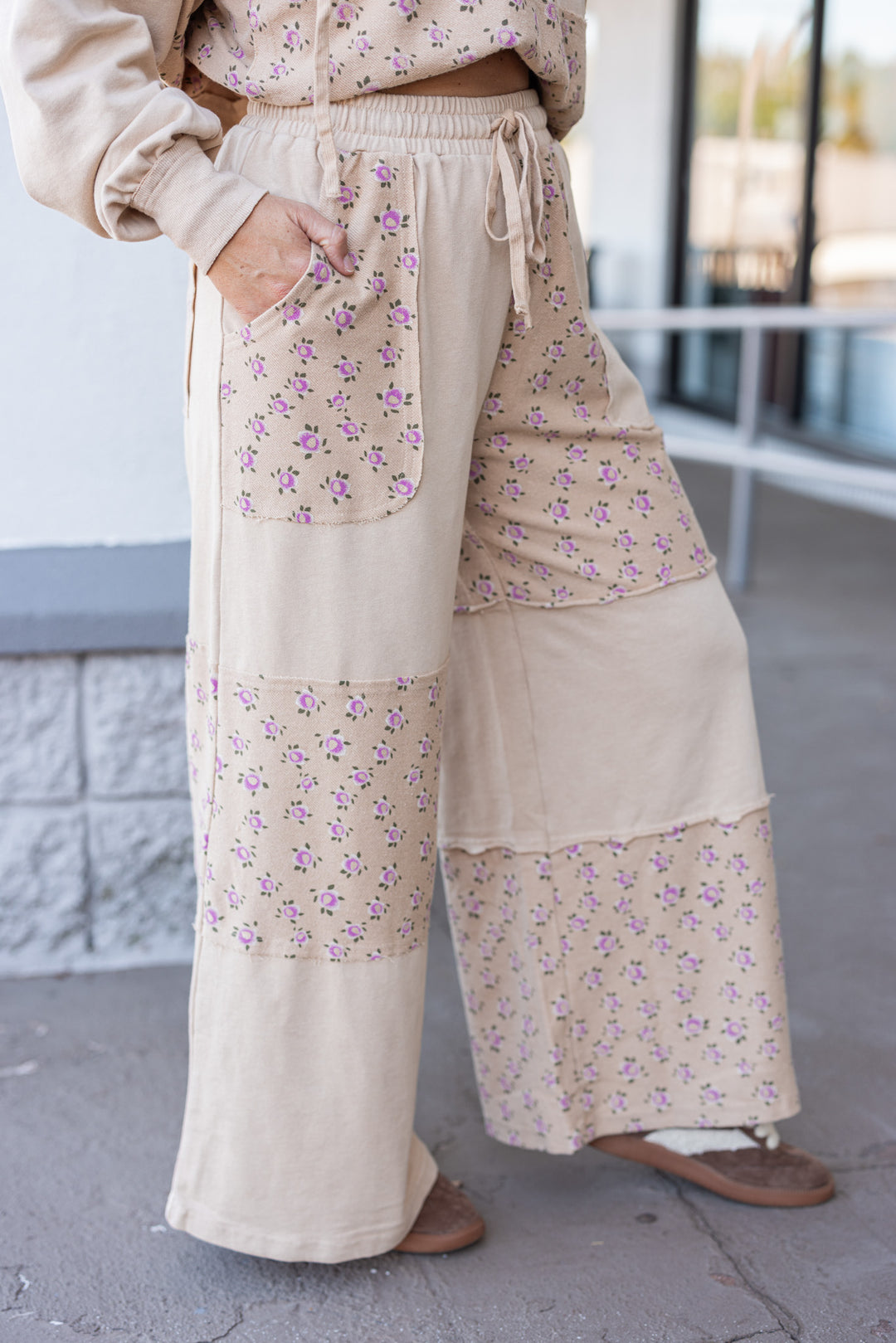 Women's washed khaki terry knit wide leg pants with pink floral print colorblock by Easel showing side view
