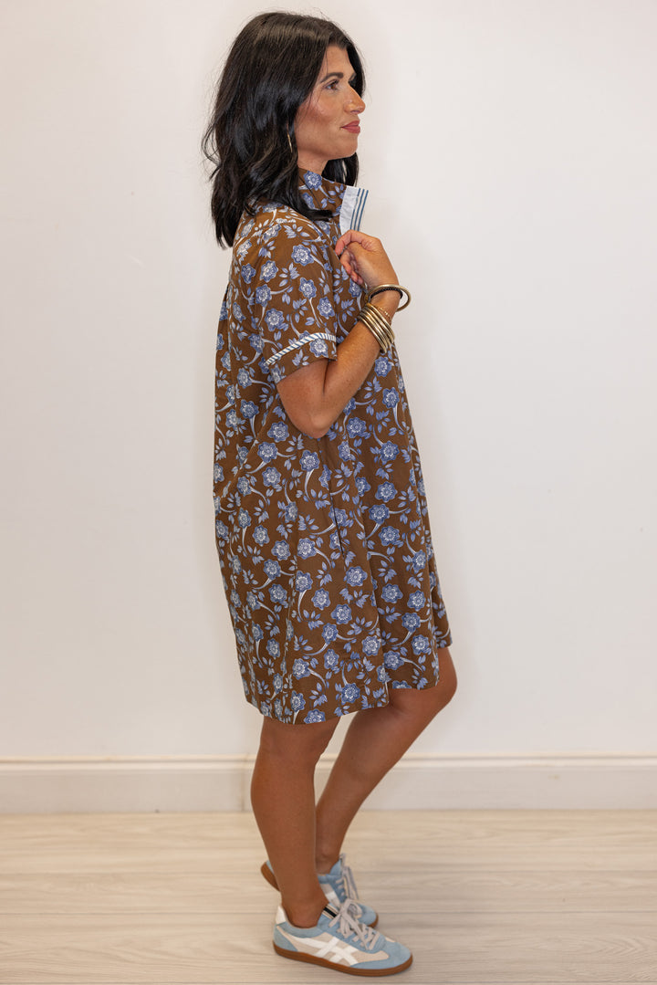 Women's brown dress with blue floral print and striped trim by Entro showing full side view