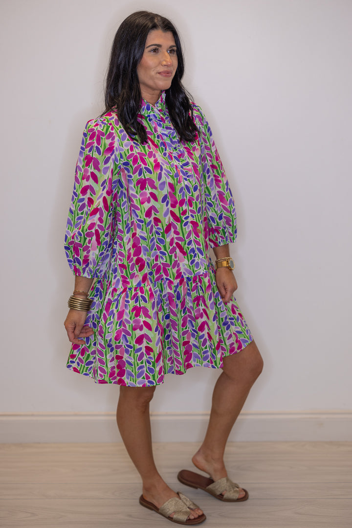 Women's green poplin dress with multicolor floral print by Jodifl showing 3/4 length sleeve