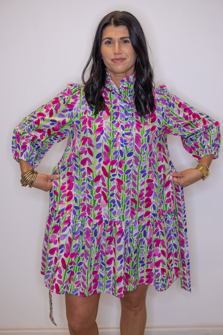 Women's green poplin dress with multicolor floral print by Jodifl showing removable belt detail