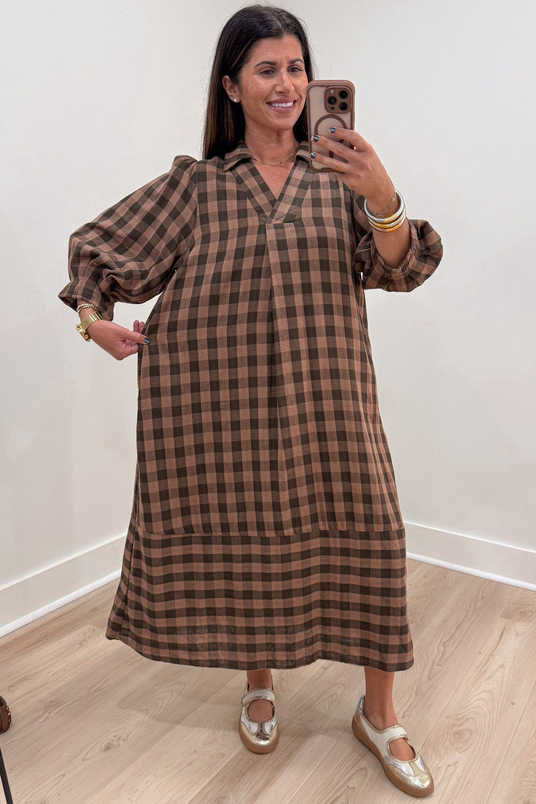 light brown and black plaid print balloon sleeve v neckline relaxed silhouette tiered cotton midi dress
