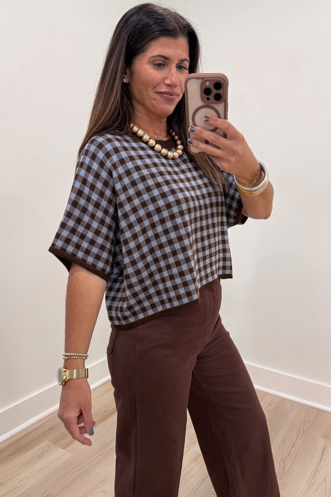brown and light blue gingham checkered print short sleeve semi-cropped knit top