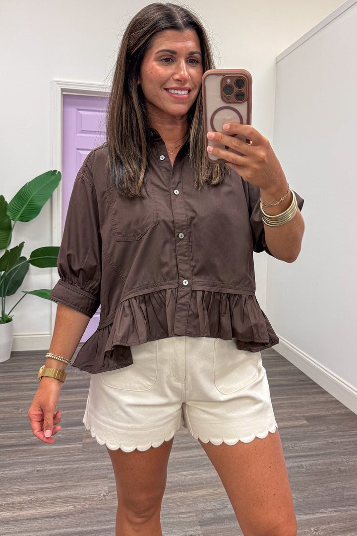 solid dark brown button down semi-cropped ruffle hem peplum top with one chest pocket