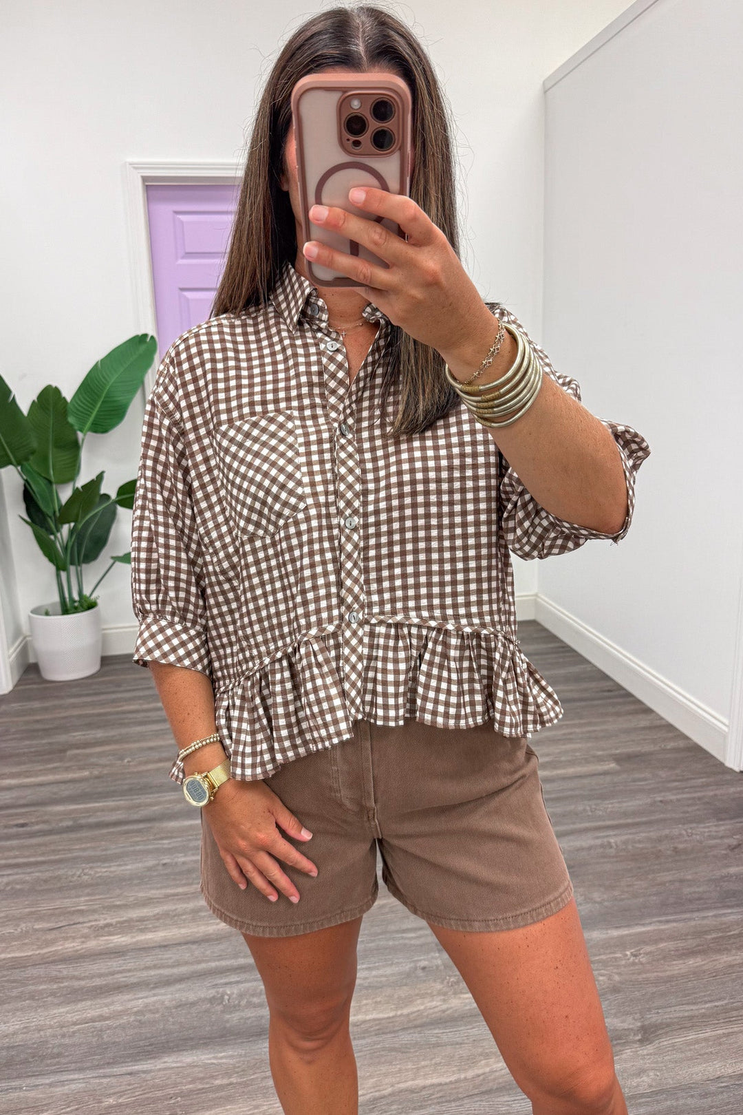 brown and cream gingham checkered print button front puff sleeve ruffled peplum hem top