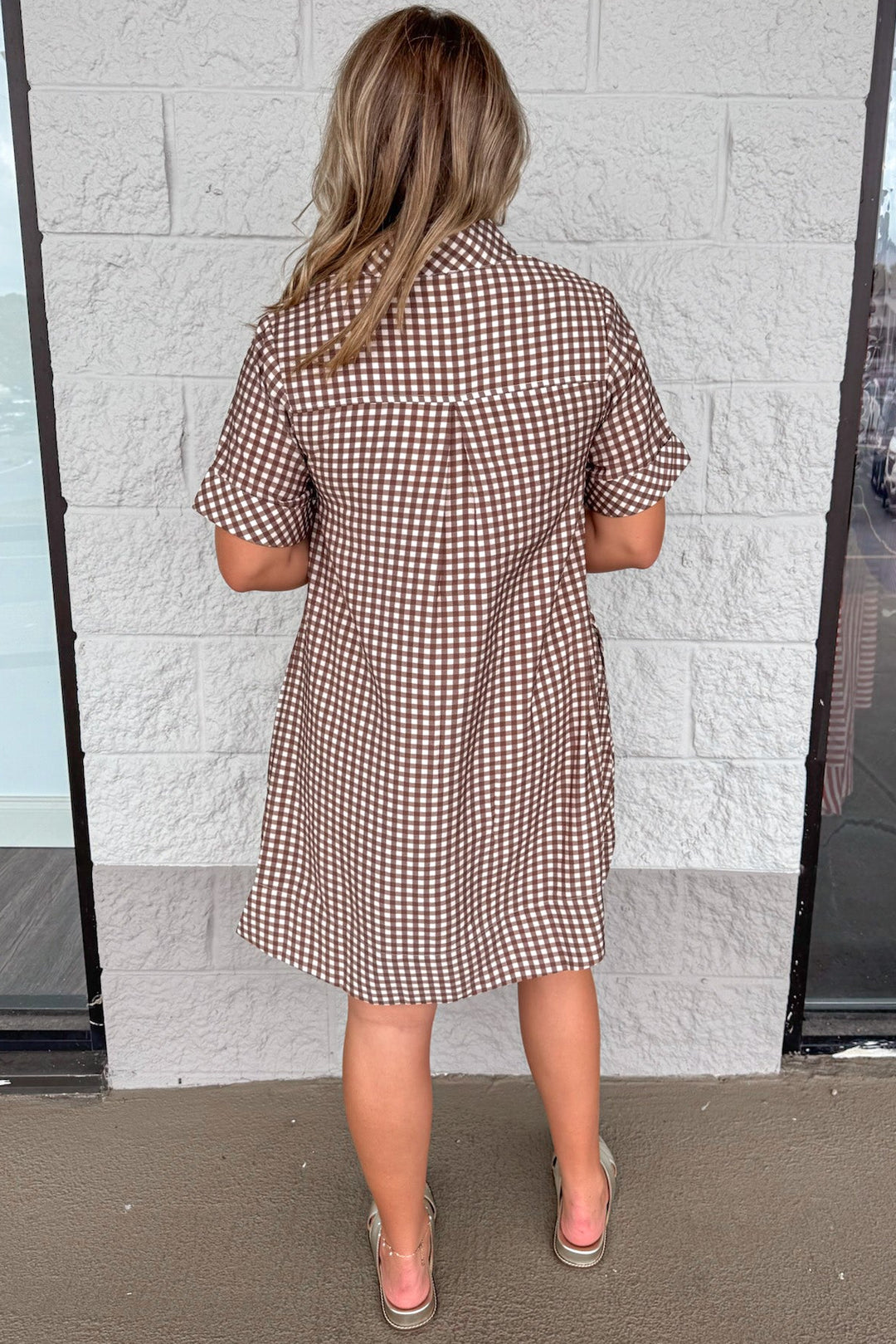 brown and cream gingham checkered print short sleeve button front bodice dress with chest and side pockets