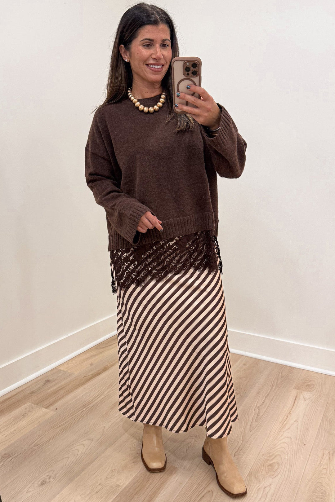 brown and cream asymmetrical diagonal striped lightweight satin midi skirt