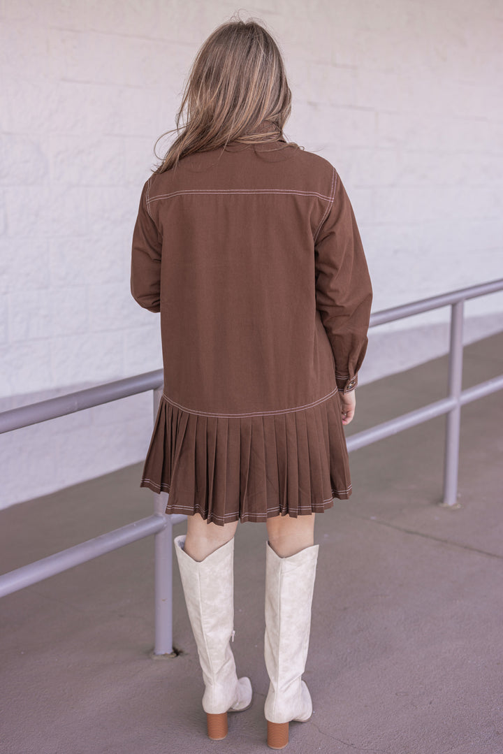 Women's brown denim twill button front dress with cream stitching trim by Entro  showing full back view