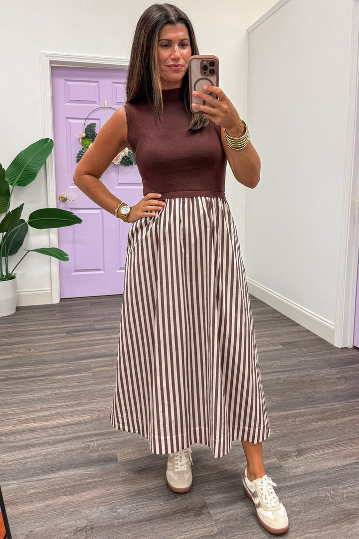 brown and ecru midi dress with sleeveless sweater top and striped woven skirt