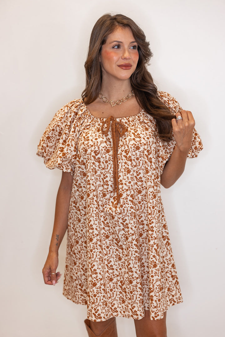 Women's beige puff sleeve dress with brown floral print by Umgee