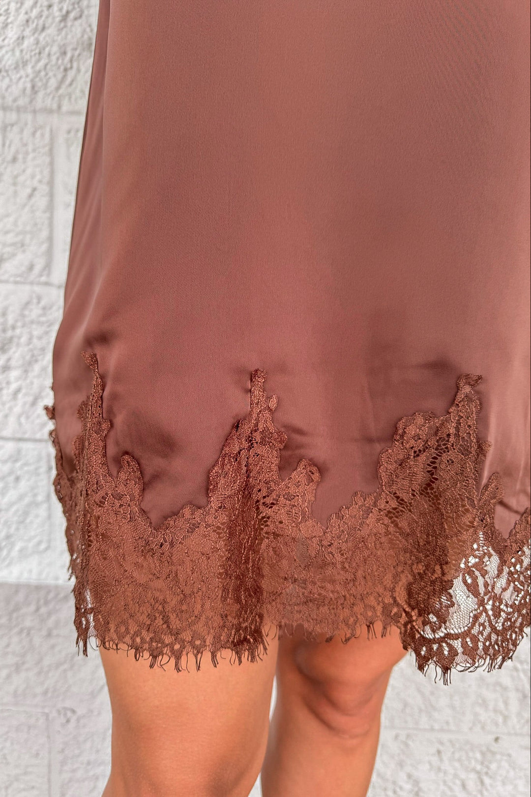 solid chocolate brown sleeveless satin shift dress with lace fringe bottom hemline