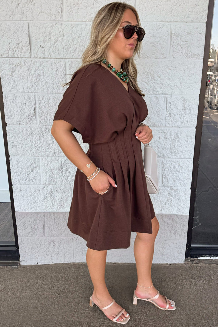 solid brown dolman sleeve v neckline pleated short dress with pintuck details and side pockets