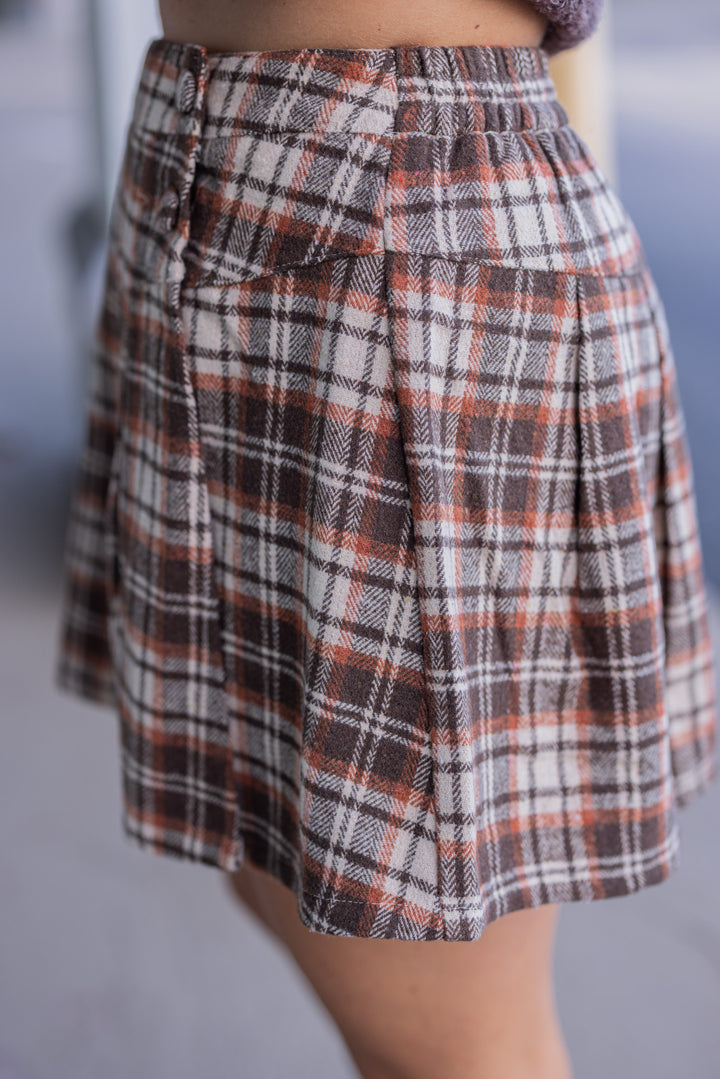 Women's brown, taupe and orange plaid flannel skirt lined with shorts by Jodifl showing up close side view