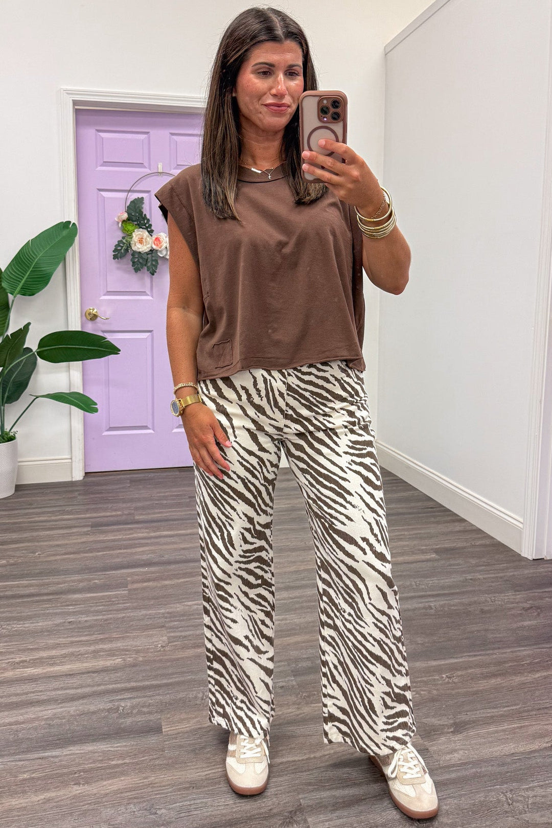 solid brown crew neckline sleeveless semi-cropped jersey knit cotton top with reverse seam details