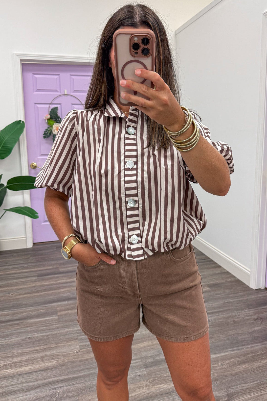 brown and ecru striped short sleeve bubble hem collared neckline button front semi-cropped top