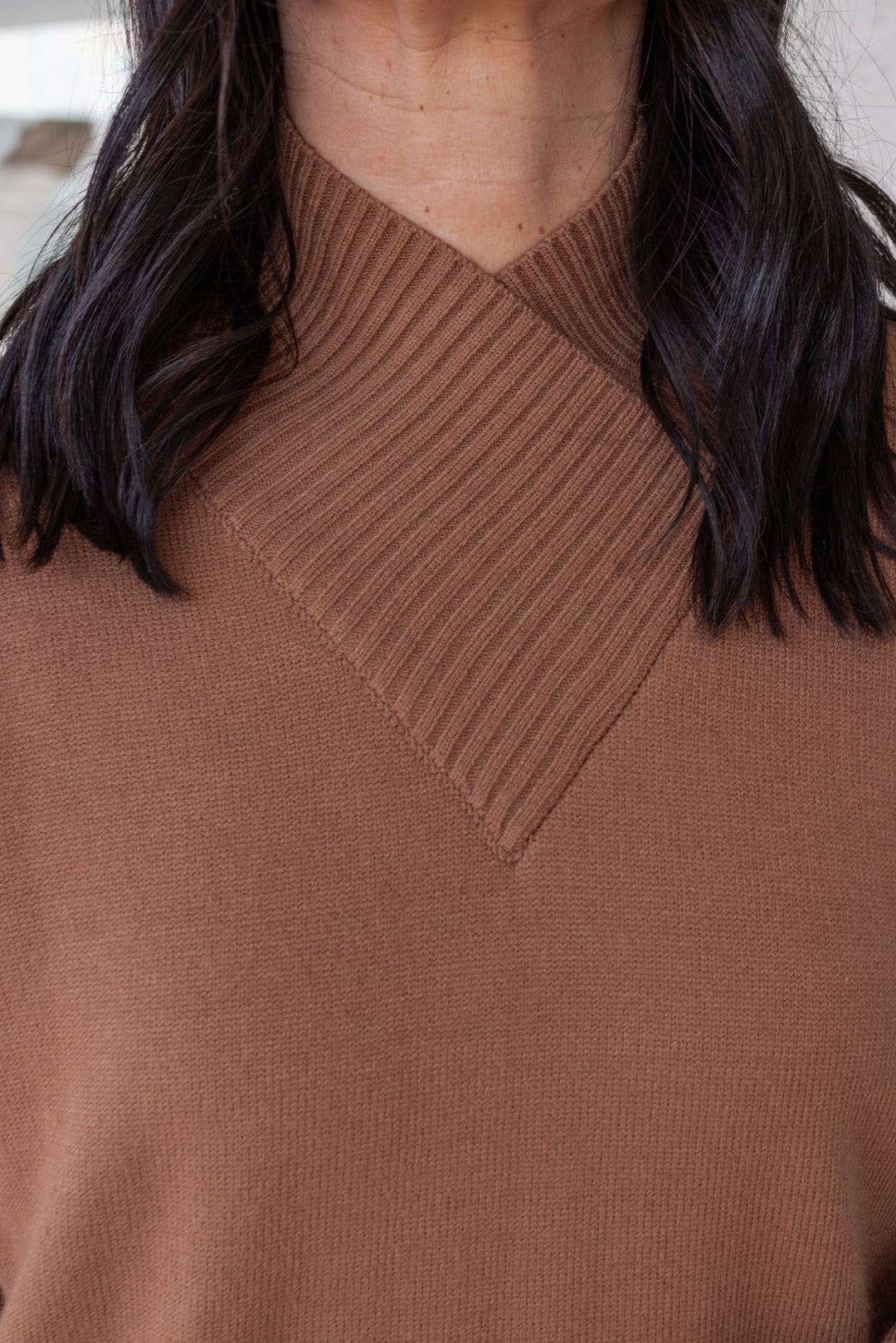 Women's cocoa brown sweater dress by Heyson showing mock neck with ribbed v detail