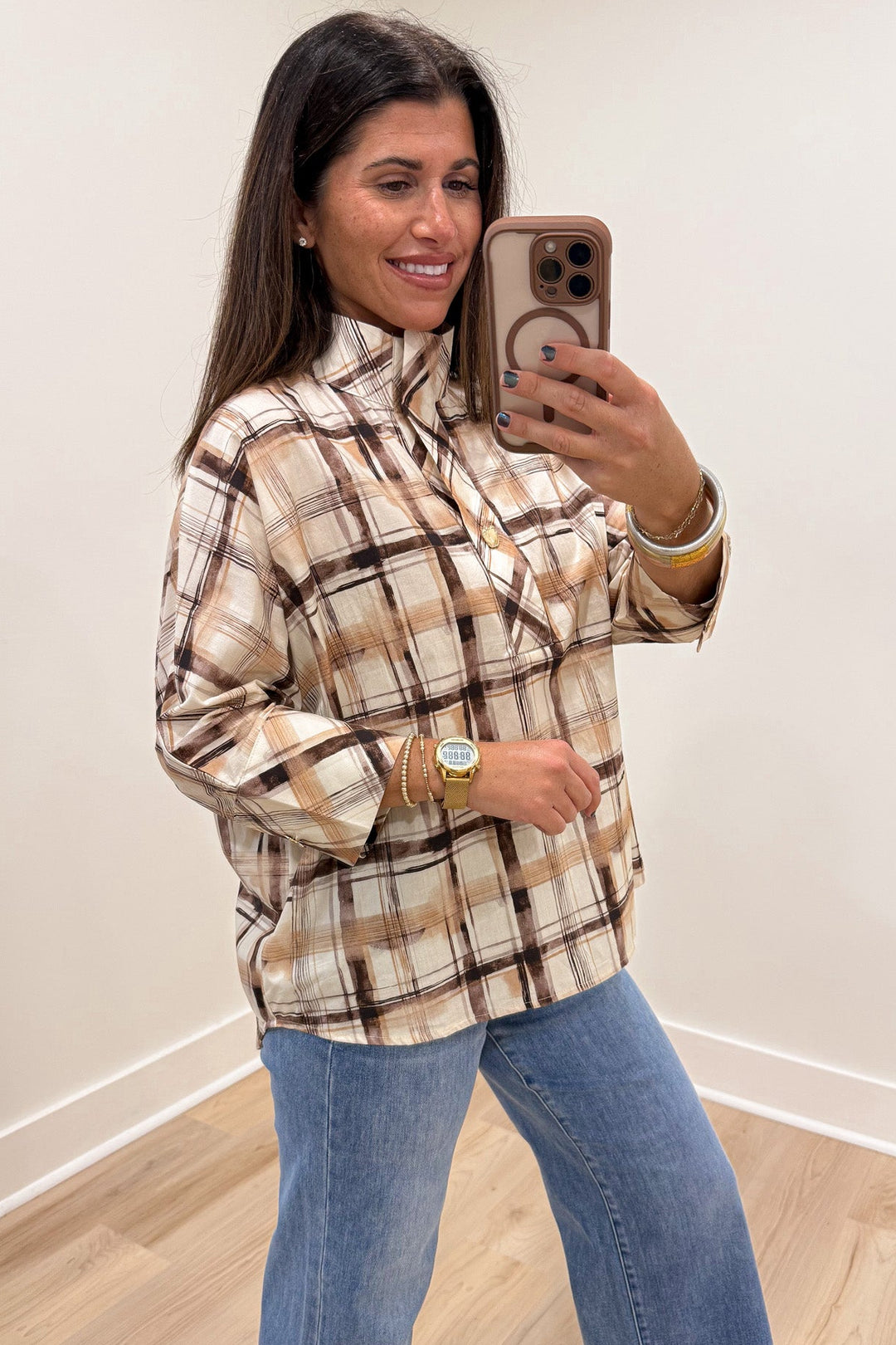 brown tan and cream plaid print drop shoulder half sleeve high neckline rounded bottom hem top