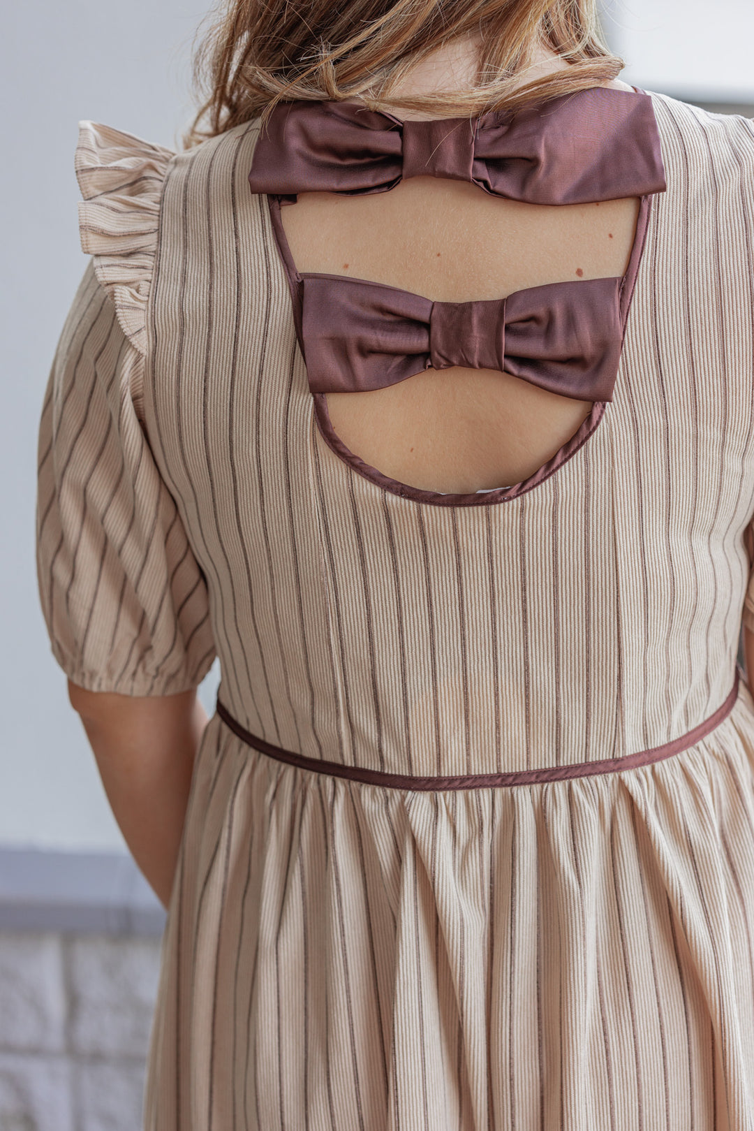 Tan and Chocolate Midi Dress by In February showing up close back view