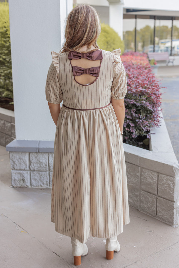 Tan and Chocolate Midi Dress by In February showing full back view