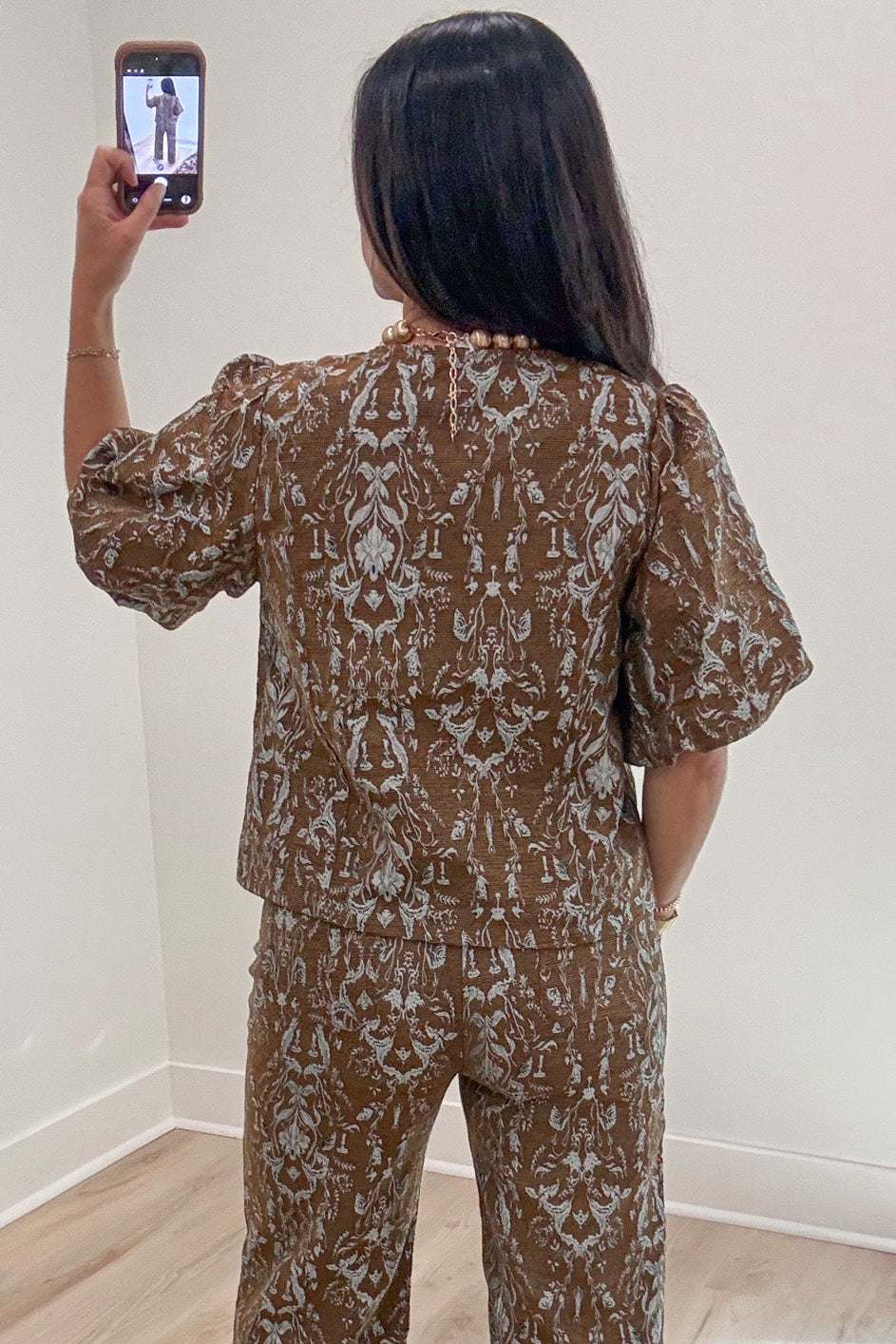 textured brown with silvery blue jacquard paisley print cuffed short sleeve button front top
