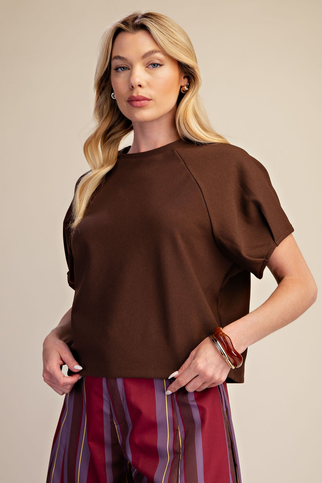 Brown knit top with gathered puff sleeves by glam