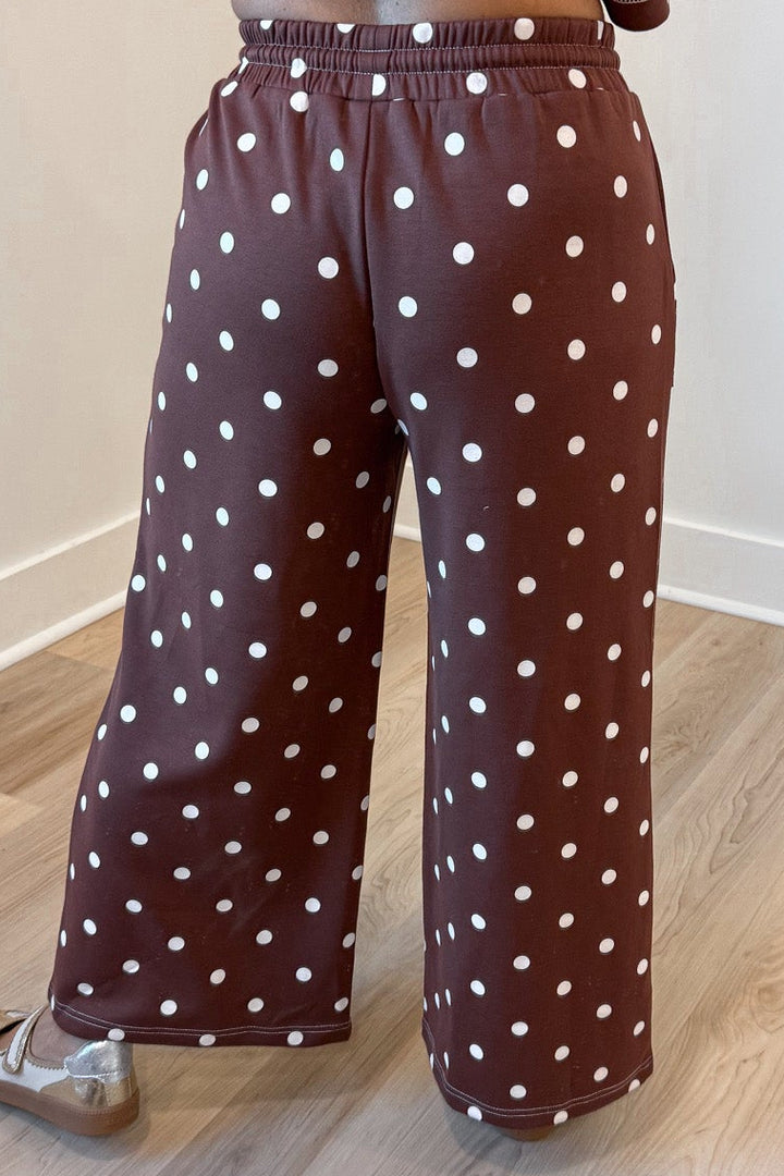 chocolate brown with white polka dot print top and pants matching knit set with reverse seam details