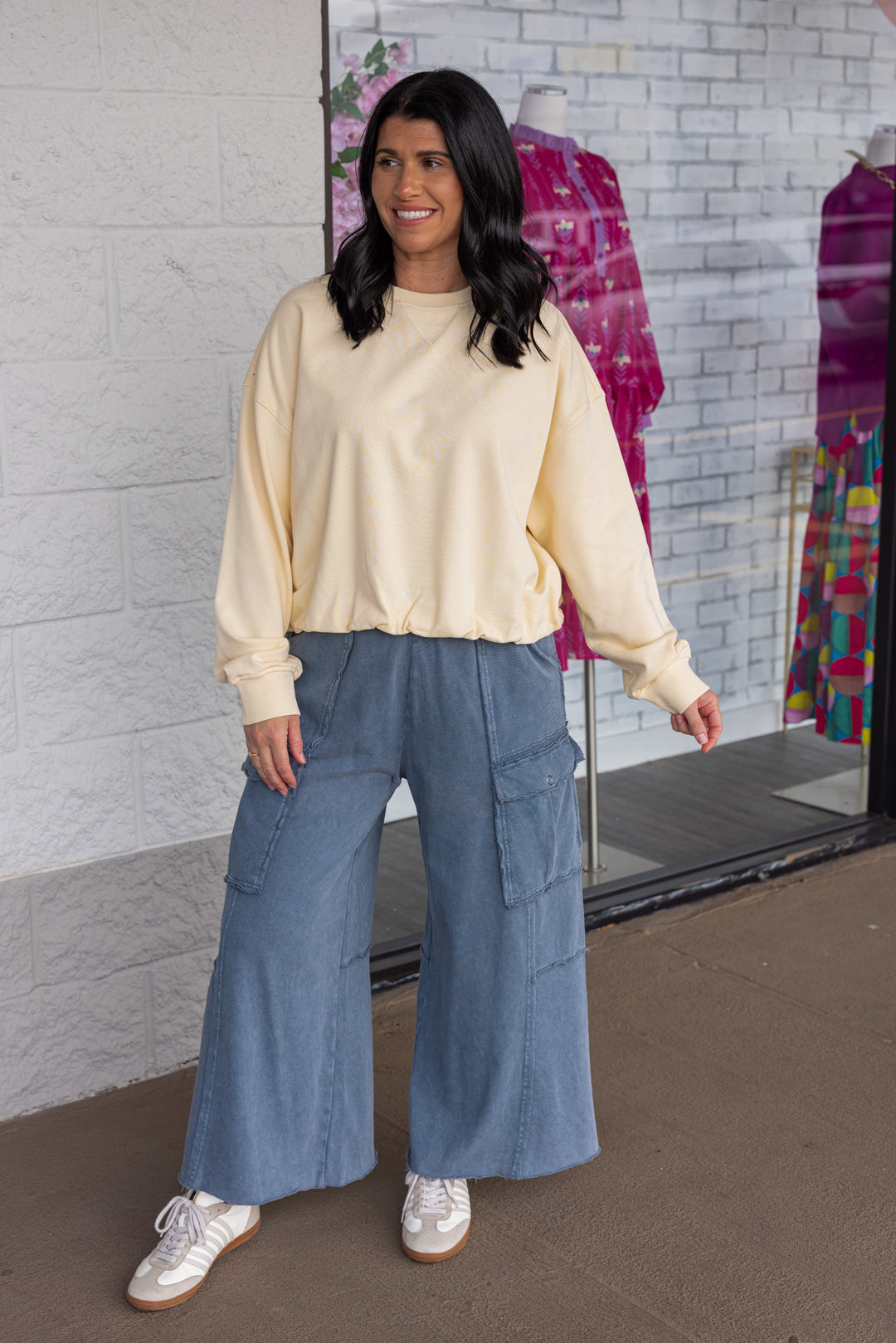 Women's butter pale yellow terry knit long sleeve pullover top with bubble hem by Wishlist showing full front view